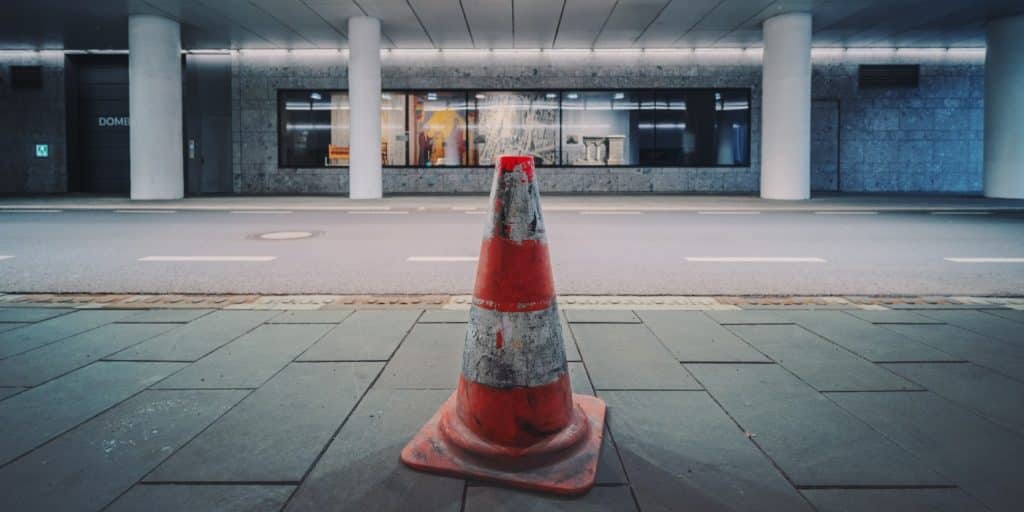 traffic cones on the sidewalk