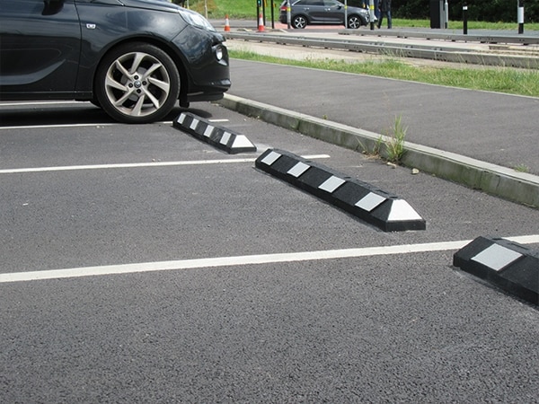 Rubber bumpers in the parking area